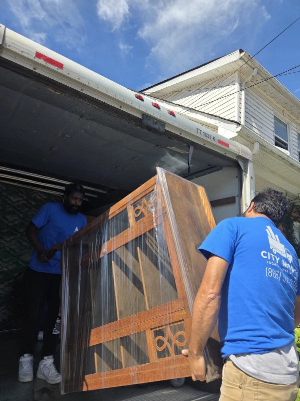 Professional movers handling a residential move in Cambridge.