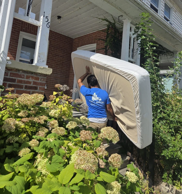 Markham residential movers carrying belongings during a home relocation.