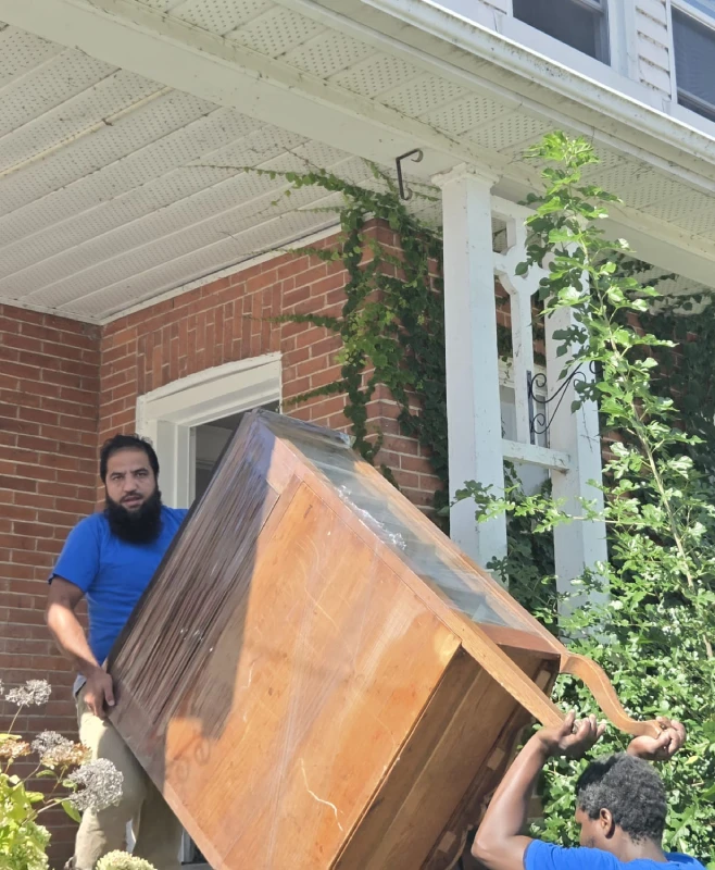 Professional movers handling a residential move in Oakville.