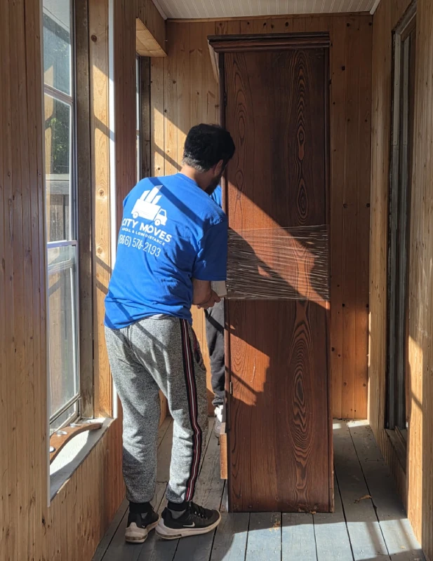 Professional movers handling a residential move in St. Catharines.